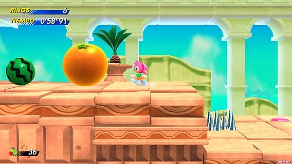 Amy Rose delante de una naranja gigante